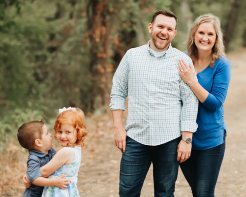 carrollton dentist zachary flink with his wife and children